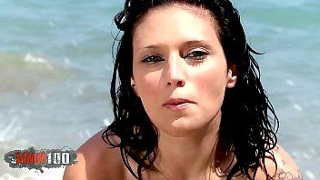 play Luxury whore sitting naked on the edge of the beach and posing