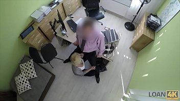 play A blonde enters the office where she works every day